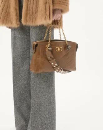 lammfellmantel 2 330x417 - Lammfellmantel