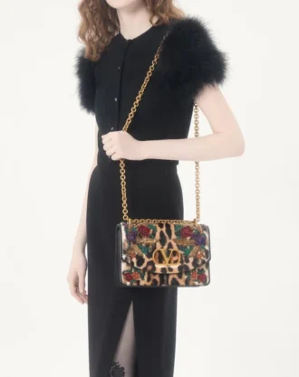 Strickjacke aus Wolle mit Federn