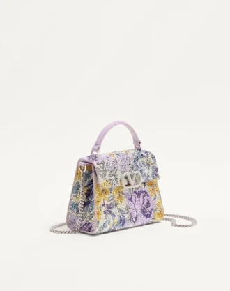 Valentino Garavani Vsling Mini-Handtasche mit Flowerism-Strassmotiv und Juwelenlogo